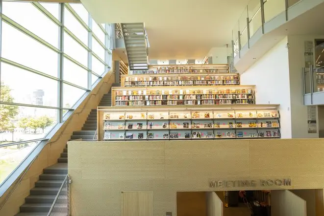 Patrons must go up a set of stairs to enter three fiction sections in the new Hunters Point Library.